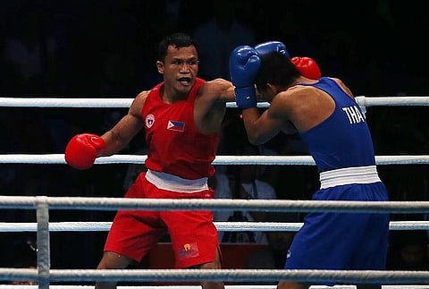 MANILA. Charly Suarez dominates Thailand's Khunatip Pidnuch in their 30th Southeast Asian (SEA) Games men's lightweight finals (60 kg) finals via unanimous decision at the Philippine International Convention Center (PICC) evening of December 9. (Contributed photo)