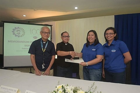 BACOLOD. (From left) Don Bosco Training Institute Lector Fr. Eli Santos and Technical Director Fr. Cyril Cardinal with Victorias Milling Company president and chief operating officer Minnie Chua and chief financial officer Kristine Cabuguason during the agreement signing at the Victorias Golf and Country Club in Victorias City on Monday, February 10, 2020. (Contributed Photo)