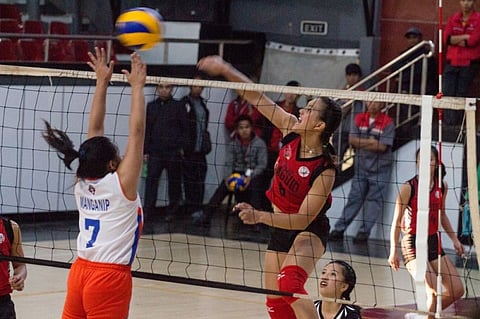 BAGUIO. In this file photo, University of Baguio Lady Cardinals' team captain, Marry Atuban score past Kings College of the Philippines team during last year's staging of women's volleyball in the Baguio-Benguet Educational Athletic League (BBEAL). (Photo by Jean Nicole Cortes)