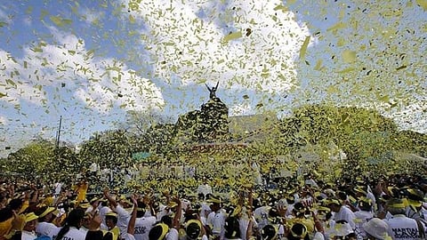 MANILA. In this February 25, 2013, file photo, yellow confetti rains on hundreds of people visiting the People Power Monument along Edsa Boulevard in Quezon City, Philippines, to celebrate the 27th anniversary of the People Power Revolution.