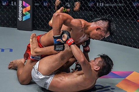 WINNING CIRCLE. Honorio Banario showcased his improved ground game against Shannon Wiratchai to escape a split decision victory in One Championship's King of the Jungle closed door event at the Singapore Indoor Stadium. (ONE photo) 