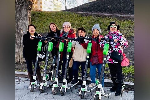 NORWAY. Posing on scooters at the Oslo Park are: Emma, Gladys, Zeny, Janet, Genie, and the author. (Photo by Debb Bautista)
