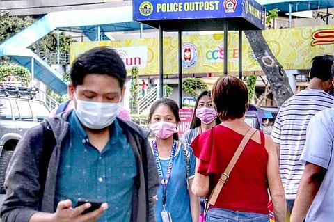 CEBU. In this January 2020 photo, people walking in downtown Cebu wear mask to prevent infection of coronavirus disease. The DOH said there is still no need to declare lockdown despite rapid increase of Covid-19 confirmed cases in the Philippines. (Photo by Amper Campaña) 