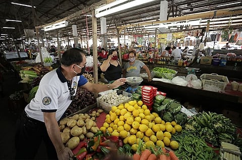 PAMPANGA. Members of the Local Price Coordinating Council of San Fernando, Pampanga conduct monitoring and inspection activities among market vendors at the Old Public Market in Poblacion Area on April 14, 2020. (CSF-CIO)