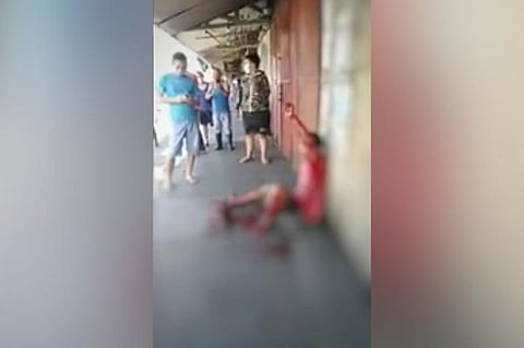 BACOLOD. Epraim Anhao, 27, of Barangay Estefania in Bacolod City, was shot by a security guard in front of K-Mart store in Barangay 22, Bacolod City Sunday, April 19, 2020. (Screenshot from Wil Chinito video)