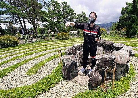 LEARNING FROM BAGUIO. Department of Tourism Secretary Bernadette Romulo-Puyat learns from the "new normal tourism" in Baguio while touring the Mirador Jesuit Villa and Retreat House on Wednesday, September 2.  Puyat is backing the tourism program between Baguio and Ilocos Region in an effort to achieve a slow and safe return of activities. (Photo by Jean Nicole Cortes)
