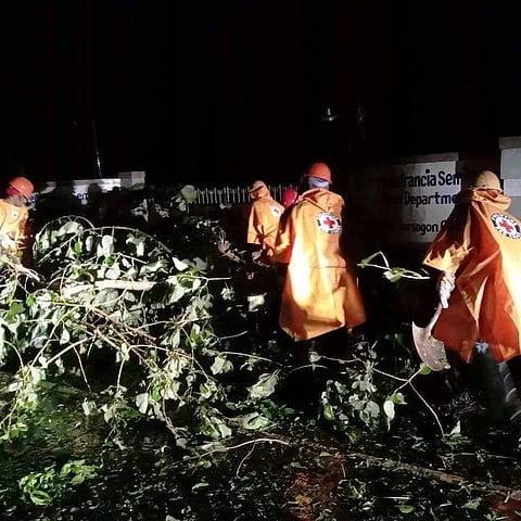 BICOL. A team from the Philippine Red Cross conducts clearing operations in the aftermath of Typhoon Quinta in Sorsogon. (Philippine Red Cross Facebook)