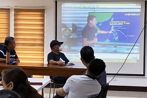 MONITORING ULYSSES. Mayor Danilo Guintu, Vice Mayor Boboy Lacap and members of MDRRMC watch updates of Pagasa regarding severe tropical storm 'Ulysses' during a meeting Wednesday, November 11, 2020. (Photo by Princess Clea Arcellaz) 
