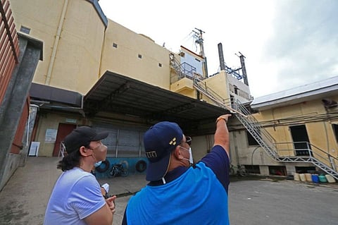 BURGLARY. Lapu-Lapu City Mayor Junard Chan (right) inspects the Gaisano Mactan Island Mall in Barangay Pusok that got burglarized by unidentified men on Thursday, Jan. 7, 2021. With Chan is the mall's general manager. / Alan Tangcawan