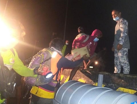 ZAMBOANGA. Personnel of the Philippine Navy rescue 19 people from a distressed wooden-hulled vessel early Monday, June 14, northeast of Bitinan Island, Banguigui, Sulu. A photo handout shows Navy personnel assist and transported the rescued passengers to the port of Luuk, Sulu. (SunStar Zamboanga) 
