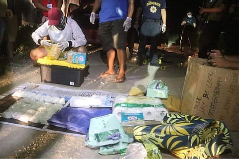 CEBU. Illegal drugs and other items were seized from two suspects who were killed in a drug bust in Barangay Mambaling, Cebu City Thursday night, July 8, 2021. (Amper Campana)