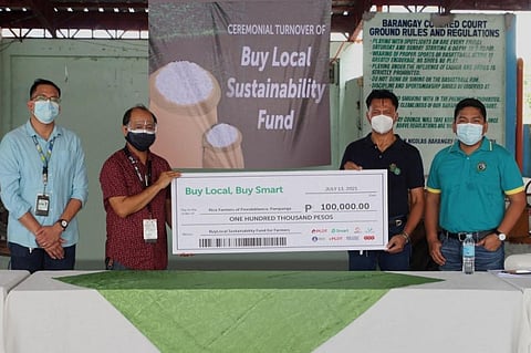 AID FOR FARMERS. PLDT and Smart, together with Cropital, turn over P100,000 worth of capital aid to Floridablanca farmers. (Contributed photo)