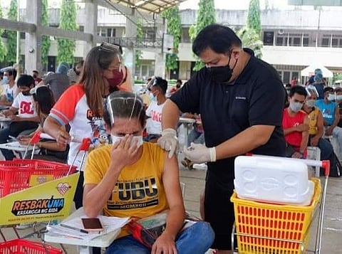 BACOLOD. Dr. Chris Sorongon lead the inoculation in one of the vaccination sites in Bacolod City recently. (Contributed photo)