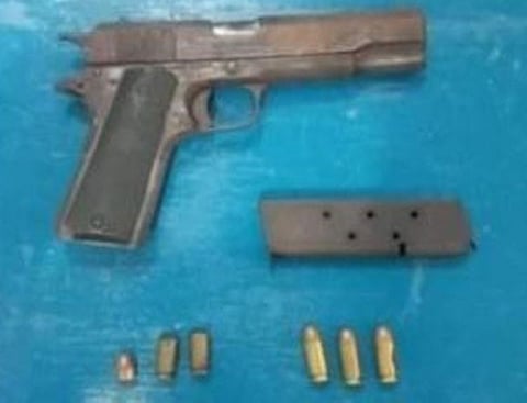 DRUG SUSPECT. A drug suspect was killed in a warrant of arrest operation by joint Marines and policemen on Sunday, October 10, in Datu Baguinda Putih village, Sitangkai, Tawi-Tawi. A photo handout shows the caliber .45 pistol and ammunition the troops recovered from the slain suspect after the shootout. (SunStar Zamboanga)