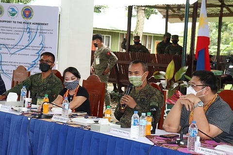 ZAMBOANGA. Leaders of the military, police, and Moro Islamic Liberation Front (MILF) together with officials of Zamboanga Sibugay province on Saturday, October 23, sign affirmation of support to the peace agreement. A photo handout shows Major General Alfredo Rosario, Jr., commander of the Western Mindanao Command (2nd from right), delivering a message during the activity at the 102nd Infantry Brigade headquarters in Sanito village, Ipil, the capital of Zamboanga Sibugay. (SunStar Zamboanga)