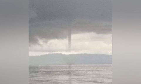 WATERSPOUT. A netizen captures on video a waterspout in the seawaters off Argao town in southern Cebu on Wednesday, June 22, 2022. There were also waterspouts in the Camotes Islands in northern Cebu and in Dauis town in Bohol on the same day. / Romeo Medequillo