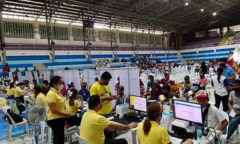  FUEL DISCOUNT CARDS. Officials of the Department of Agriculture in Central Visayas who were in Argao, southern Cebu on Friday, July 29, 2022, distributed fuel discount cards to 971 farmers and fisherfolk affected by the ongoing fuel crisis brought about by the war between Russia and Ukraine. / DA 7 Facebook page