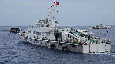MANILA. A Chinese coast guard ship tries to block the way of a Philippine supply boat (left) as it heads towards Second Thomas Shoal, locally known as Ayungin Shoal, at the disputed South China Sea on August 22, 2023.