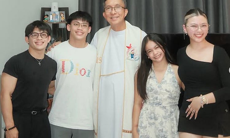 Why were the Yulo parents absent from the house blessing?