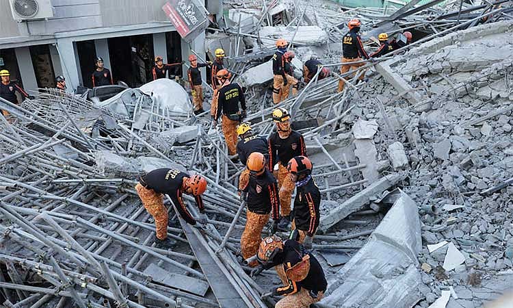 Rescue ops continue
 in AC building collapse