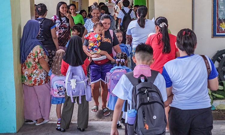 Back to school: Over 10,000 classroom shortage forces double