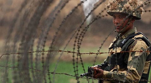Border security force personnel petrol near the fence border at Samba Sector | Photo courtesy: Indian Express 
