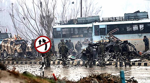 Secirity personnal near awantipora blast site. Express Photo by Shuaib Masoodi 14/02/2019