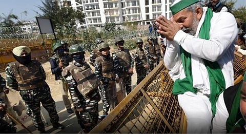 BKU Leader Rakesh Tikait gestures with folded hands to security forces
Source: The Telegraph
