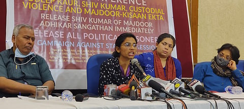 Nodeep Kaur speaking at the press conference.  Image Courtesy: The Wire