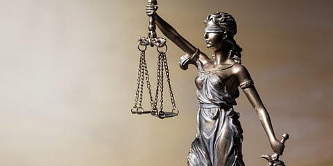 If access to justice is a constitutional right, why is providing it supposed to be an act of charity?