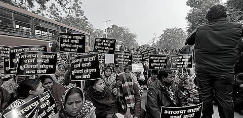 Tughlakabad residents protesting against the eviction order.