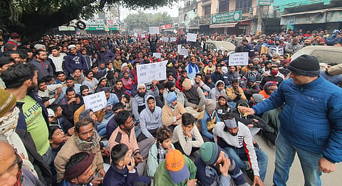 Despite the cold, women, Youth and children sitting on dharna out in the open