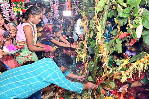 CM Hemant Soren participating in a harvest festival with the indigenous community. 