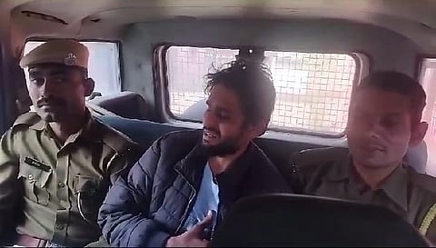 The accused being taken away by Pratapgarh police. 