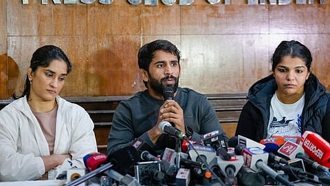 The wrestlers at the press conference recently