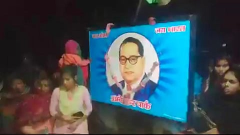 The conflict arose when an Ambedkar's board was erected on the disputed land by the Jatav community, prompting a complaint from the opposing party. 