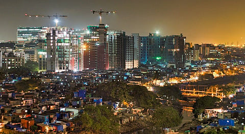 High-rise apartments in Mumbai are an outward sign of India's growing prosperity, but challenges with wealth distribution and unemployment linger.

