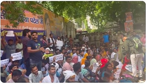 The protest took place in Lucknow, where a large number of candidates gathered and staged a sit-in in front of the minister's residence, raising slogans. 