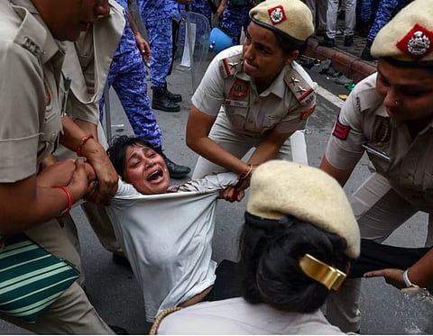 The protesters were attempting to march towards Parliament House during the ongoing Monsoon Session of Parliament when police intervened to block their route, leading to a confrontation and the subsequent use of force.
