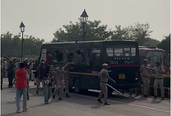 Delhi Police detaining protestors approaching Jantar Mantar on Saturday afternoon. 