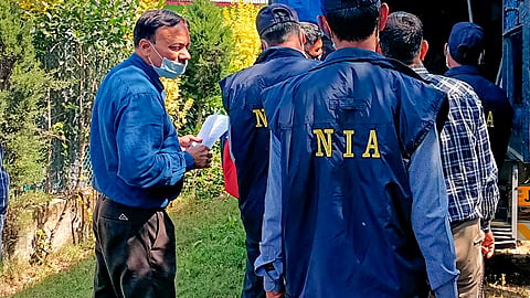 NIA officials