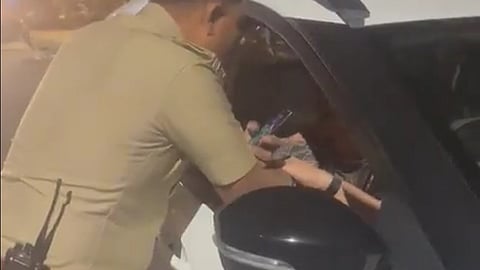 Confrontation between the police officer and Adam