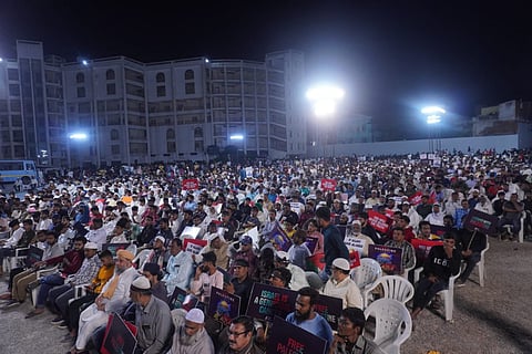 The gathering of people at the public meeting