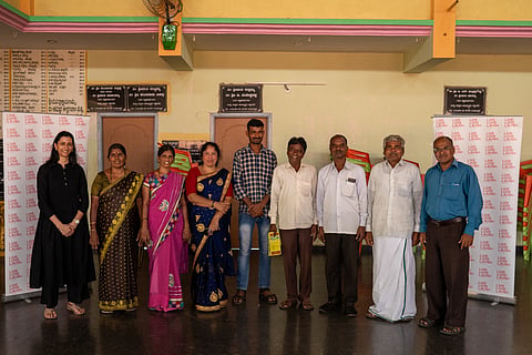 Anisha Padukone, CEO of LiveLoveLaugh (far left), and Janardhan, Director of the Association for People with Disability (far right), along with community leaders in Davangere district. 