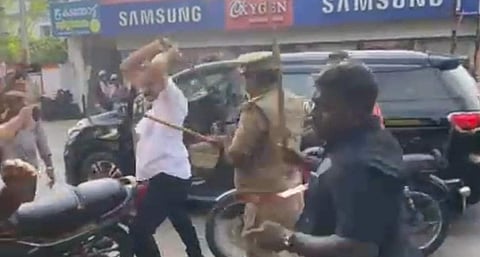 CM's security personnel assaulting KSU activists in Alap[uzha district on December 15 (Video grab) 