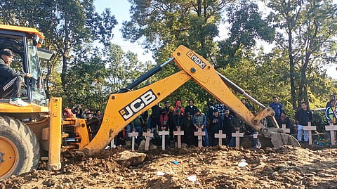 87 bodies from Kuki-Zo tribes were laid to rest in Churachandpur hills on December 20.