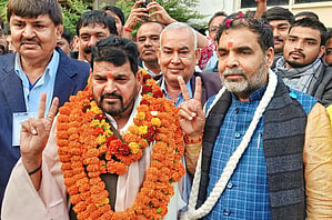 Brij Bhushan Singh (left) with Sanjay Singh
