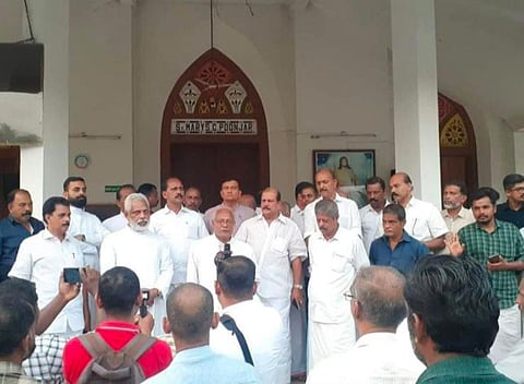 Protesters at the Poonjar church