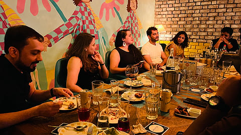 People at a Two Tables event