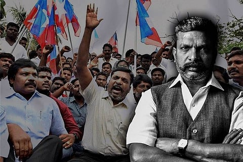 VCK Chief Thol Thirumavalavan against the backdrop of a protest by VCK
